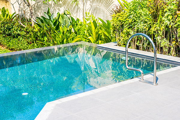 Beautiful landscape outdoor swimming pool in hotel and resort fo