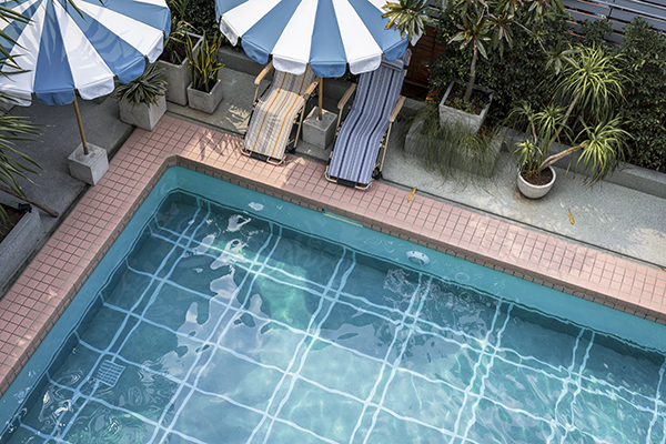 Swimming pool in summer time